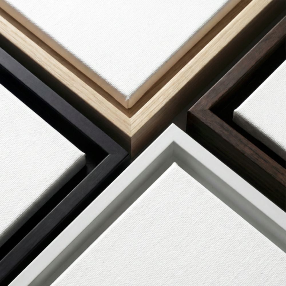 Examples of Black, Espresso, White and Natural color of frames used for framed canvas wall art.