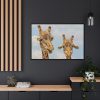 Two Giraffe Face Close-up Framed Canvas