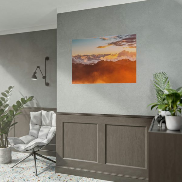 Clouds Envelope a Mountain Range During Sunset Poster
