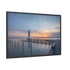 Lighthouse on the Ocean Dock Framed Canvas