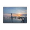 Lighthouse on the Ocean Dock Framed Canvas