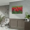 101875-619.jpg Vibrant Red Tulips Bloom in a Field Poster