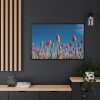 A Low-Angle Shot of a Field of Red Tulips Framed Canvas