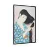 Woman Combing Her Hair Framed Canvas