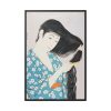 Woman Combing Her Hair Framed Canvas
