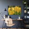93854-594.jpg Yellow Tulips Blooming in the Field Framed Poster