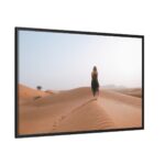 Woman Walking on Sandy Deserts Framed Canvas
