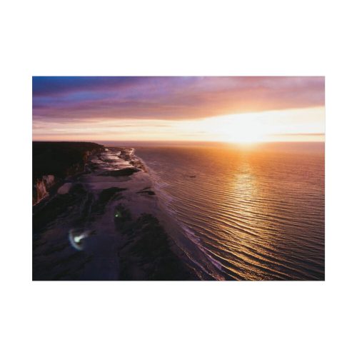 Sunset Over an Ocean Cliff Poster