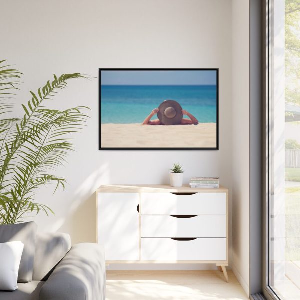 Woman Wearing a Hat on the Beach Framed Canvas