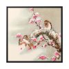 Bird Perching on Tree Top Framed Canvas