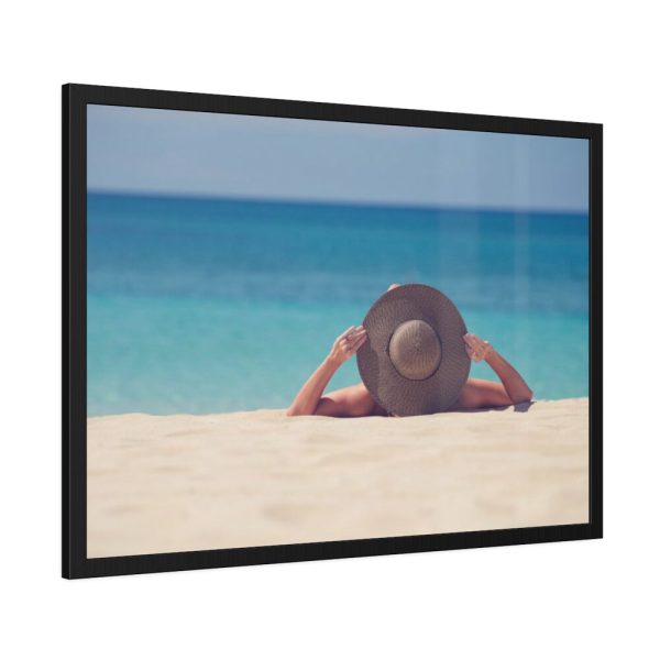 Woman Wearing a Hat on the Beach Framed Poster