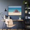 Woman Wearing a Hat on the Beach Framed Poster