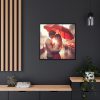 Couple Embracing Under Red Umbrella Framed Canvas