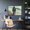 93855-321.jpg Person Walking at the Edge of the Surf on a Beach Framed Poster