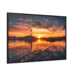 Lighthouse With a Sunset View Framed Canvas