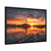 Lighthouse With a Sunset View Framed Poster