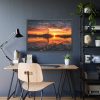 Lighthouse With a Sunset View Framed Poster